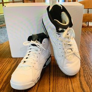 Air Jordan Sneakers, size 8.5. BOX IS NOT INCLUDED.